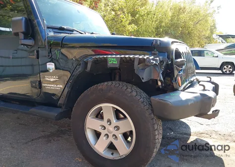 2007 Jeep Wrangler Unlimited Sahara z USA, uszkodzony, nr VIN 1J4GA59187L207002